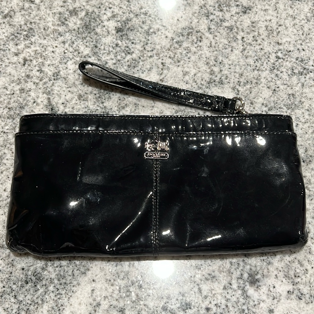 Coach black wristlet.